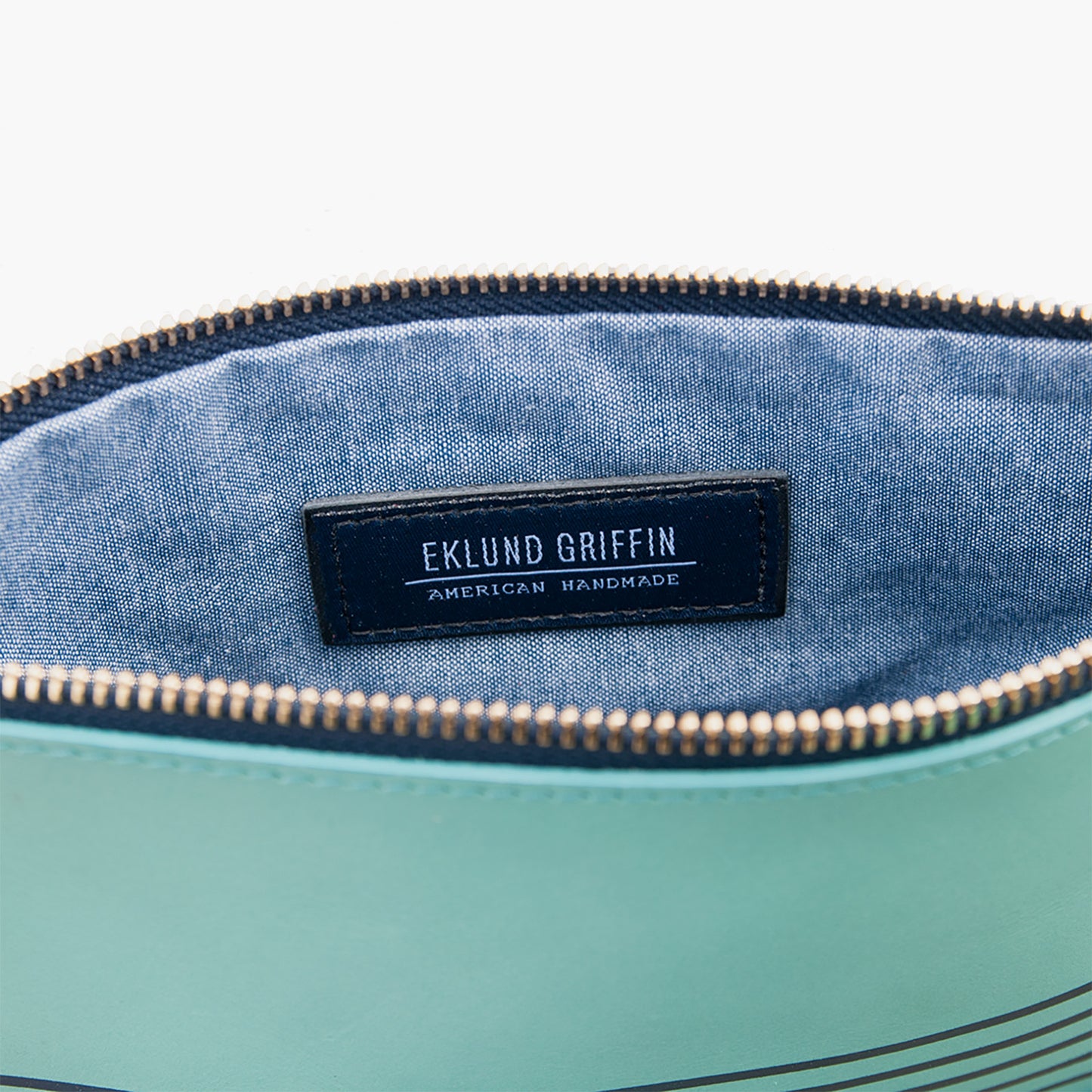 Buoy Block Clutch in Tidal Teal + Coral Red